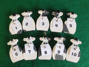 10 Twerbly cows - sitting in two rows!